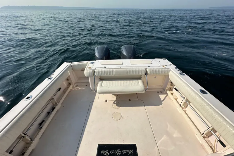 R & R Yacht Photos Pics 2008 Grady White Express boat deck with twin engines on open water.