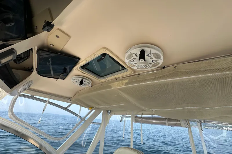 R & R Yacht Photos Pics 2008 Grady White Express boat interior with speaker and hatch, overlooking the ocean.