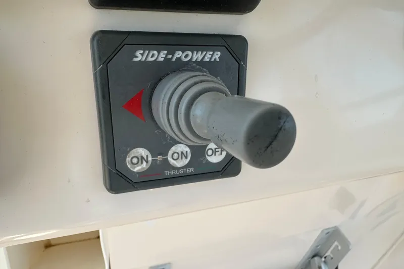 R & R Yacht Photos Pics Side-Power thruster control on 2008 Grady White Express boat dashboard.