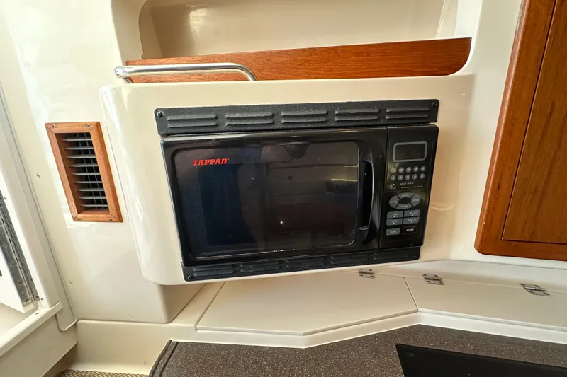 R & R Yacht Photos Pics 2008 Grady White Express boat kitchen with Tappan microwave oven.