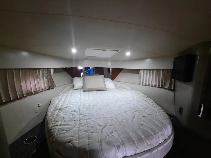 Paradox Yacht Photos Pics Interior cabin of a 2008 Formula 40 PC yacht with a cozy bed.