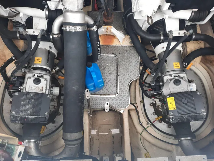 Paradox Yacht Photos Pics Engine compartment of a 2008 Formula 40 PC boat with twin engines and various components.