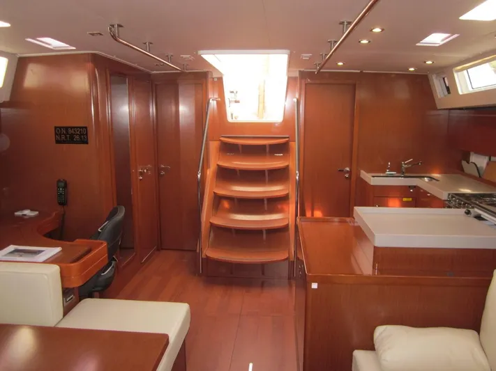 Cameli Yacht Photos Pics Interior of 2020 Beneteau Oceanis 55 yacht, featuring elegant wood finishes and modern amenities.