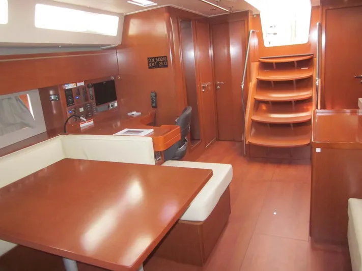 Cameli Yacht Photos Pics Interior of 2020 Beneteau Oceanis 55 yacht with wooden furnishings and modern design.