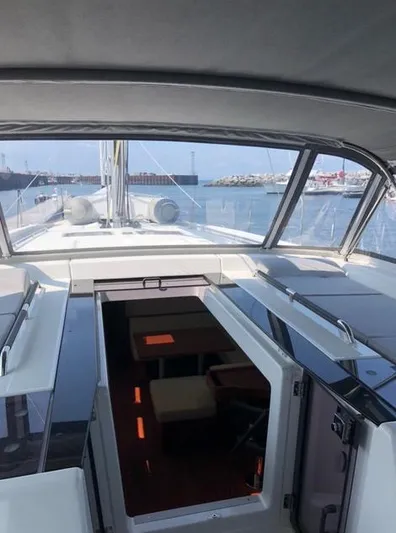 Cameli Yacht Photos Pics 2020 Beneteau Oceanis 55 yacht interior with open deck view.
