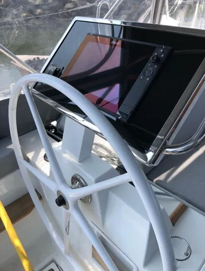 Cameli Yacht Photos Pics Steering wheel and navigation system on 2020 Beneteau Oceanis 55 yacht.
