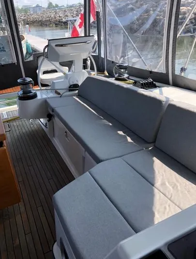 Cameli Yacht Photos Pics 2020 Beneteau Oceanis 55 yacht cockpit with seating and navigation equipment.