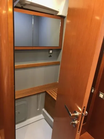 Cameli Yacht Photos Pics Interior of 2020 Beneteau Oceanis 55 yacht, featuring wooden cabinetry and modern design.