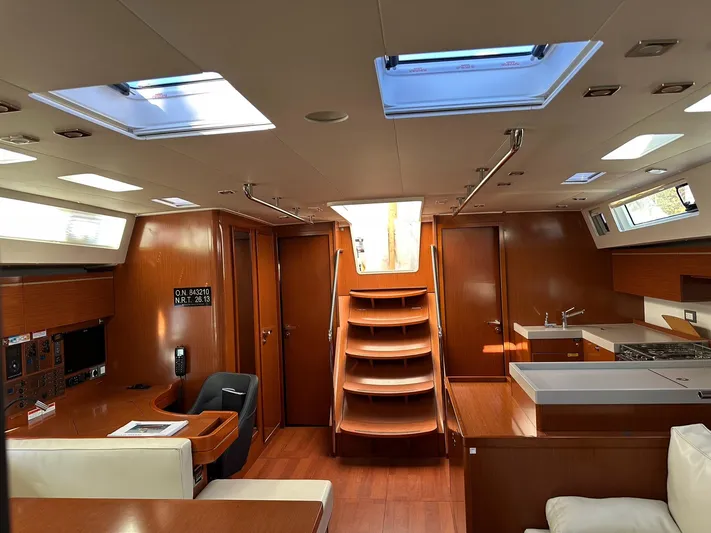 Cameli Yacht Photos Pics Interior of 2020 Beneteau Oceanis 55 yacht, featuring wood finishes and modern design.