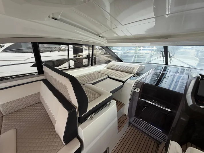 Luli Yacht Photos Pics 2017 Jeanneau Leader 46 yacht interior with luxurious seating and modern design.