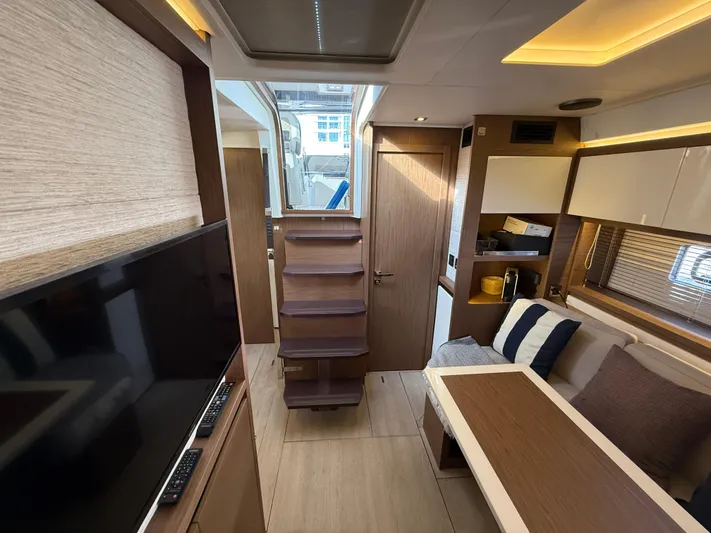 Luli Yacht Photos Pics Interior of 2017 Jeanneau Leader 46 yacht, featuring modern design and comfortable seating.