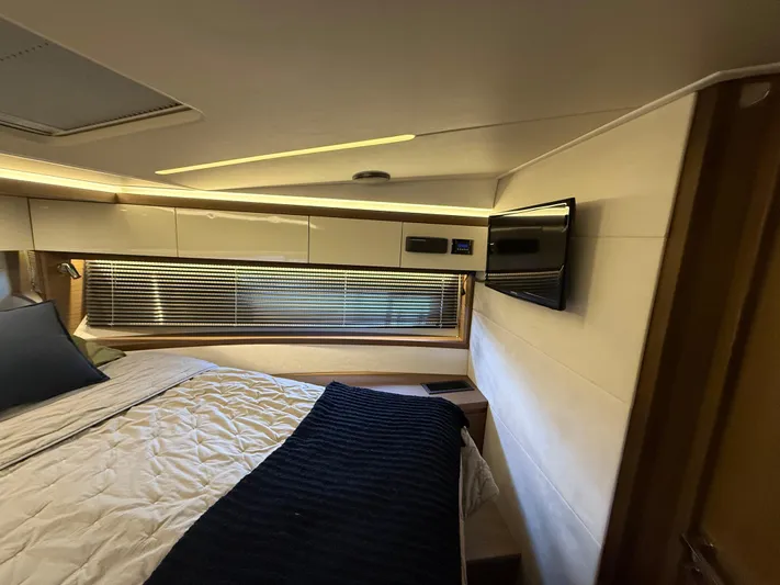 Luli Yacht Photos Pics Luxurious bedroom interior of 2017 Jeanneau Leader 46 yacht with modern amenities.