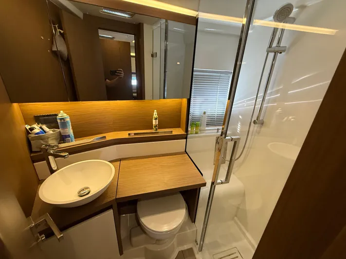 Luli Yacht Photos Pics Modern bathroom in 2017 Jeanneau Leader 46 yacht with shower and sink.