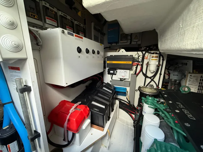Luli Yacht Photos Pics Engine room of 2017 Jeanneau Leader 46 with electrical components and battery setup.