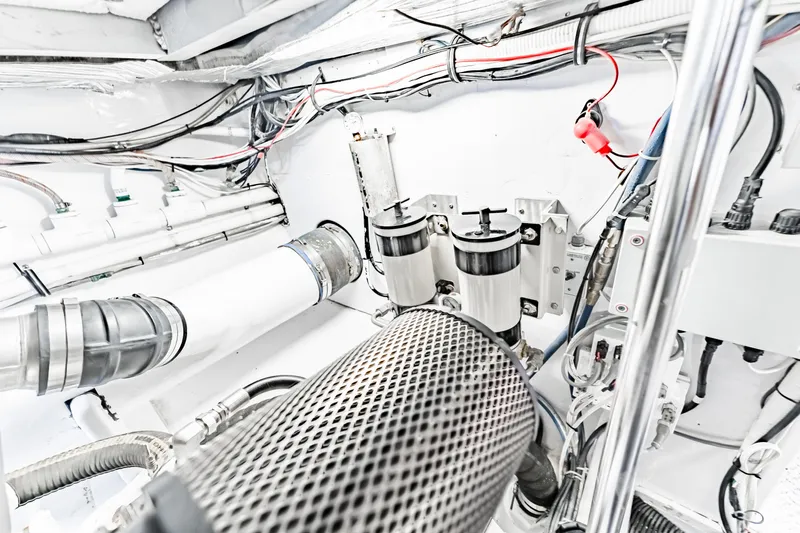 Leslie Ann Yacht Photos Pics Engine room of 1988 Buddy Davis 47 Convertible with visible wiring and components.