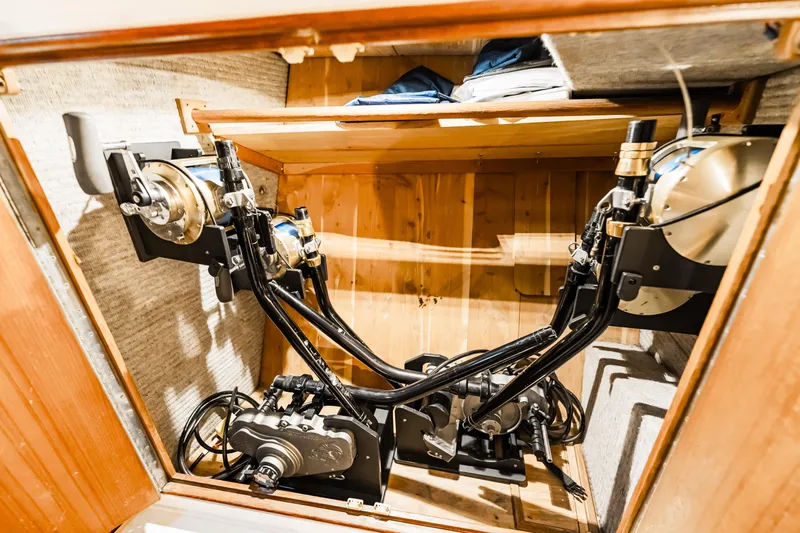 Leslie Ann Yacht Photos Pics Engine room of 1988 Buddy Davis 47 Convertible boat, showcasing mechanical components.
