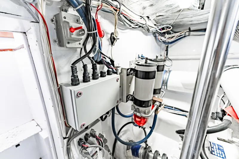 Leslie Ann Yacht Photos Pics Engine room of 1988 Buddy Davis 47 Convertible with wiring and filtration systems.