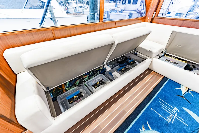 Leslie Ann Yacht Photos Pics Interior of 1988 Buddy Davis 47 Convertible with storage under white seating.