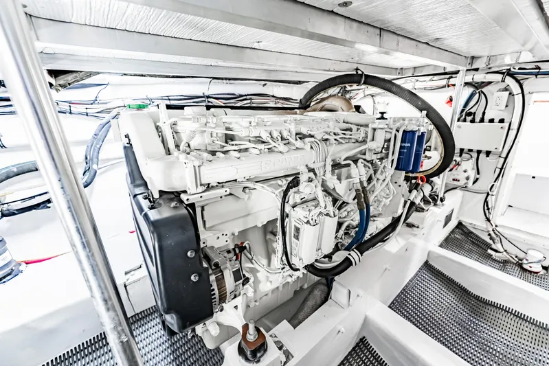 Leslie Ann Yacht Photos Pics Engine room of 1988 Buddy Davis 47 Convertible yacht, showcasing detailed machinery.