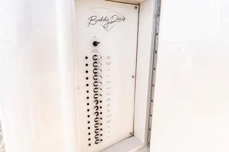 Leslie Ann Yacht Photos Pics Control panel of 1988 Buddy Davis 47 Convertible boat with labeled switches.