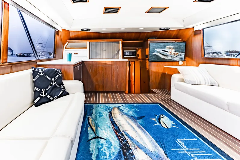 Leslie Ann Yacht Photos Pics Luxurious interior of 1988 Buddy Davis 47 Convertible yacht with nautical decor.