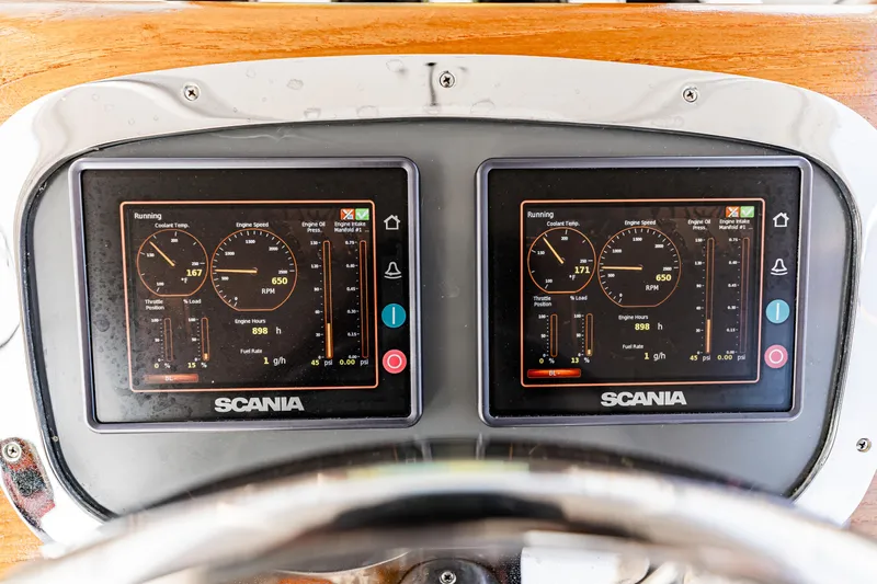 Leslie Ann Yacht Photos Pics Instrument panel of 1988 Buddy Davis 47 Convertible with dual Scania engine displays.