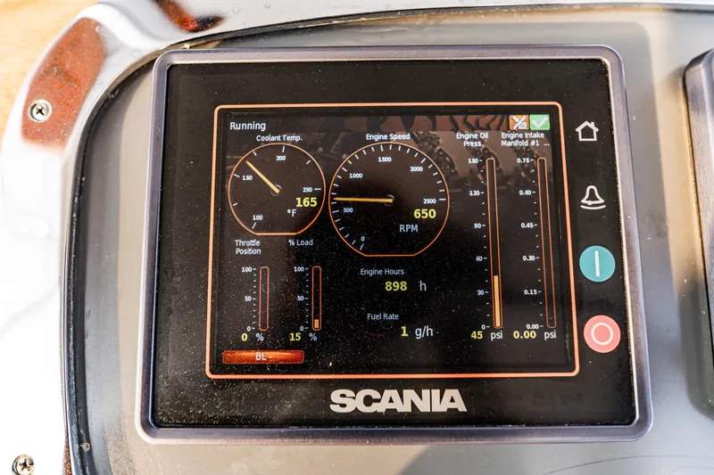 Leslie Ann Yacht Photos Pics Engine monitor display on 1988 Buddy Davis 47 Convertible, showing RPM and coolant temperature.