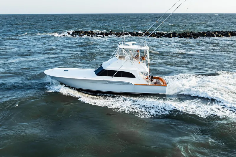 Leslie Ann Yacht Photos Pics 1988 Buddy Davis 47 Convertible yacht cruising on open sea.