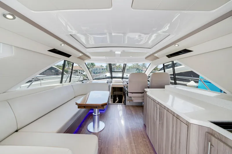 Life Is Good Yacht Photos Pics Luxurious interior of 2017 Regal 53 Sport Coupe yacht with modern seating and sleek design.