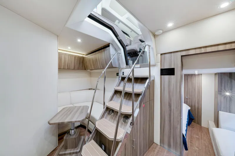 Life Is Good Yacht Photos Pics Luxurious interior of 2017 Regal 53 Sport Coupe yacht with modern design and elegant furnishings.