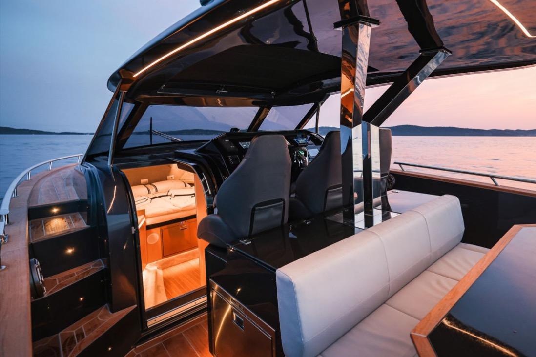 Luxurious 2026 Focus FORZA 37 OB/FB yacht interior at sunset, featuring sleek design and modern amenities.