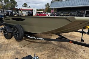 2026 Tracker Grizzly 1650 T Prairie Wings Edition boat on trailer, outdoor display.