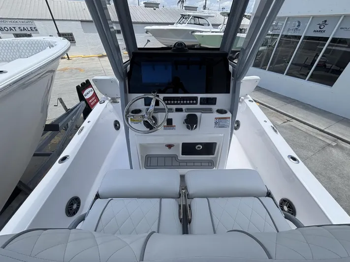  Yacht Photos Pics 2025 Sea Fox 251 Bay Fox boat interior with modern console and seating.