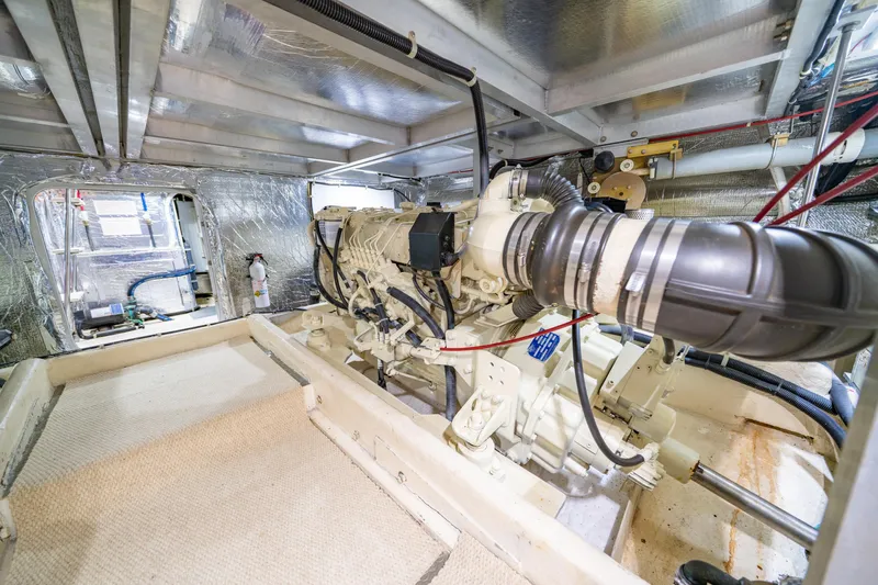 Altitude Adjustment Yacht Photos Pics Engine room of 2000 Navigator 5300 Classic yacht, showcasing mechanical components and insulation.