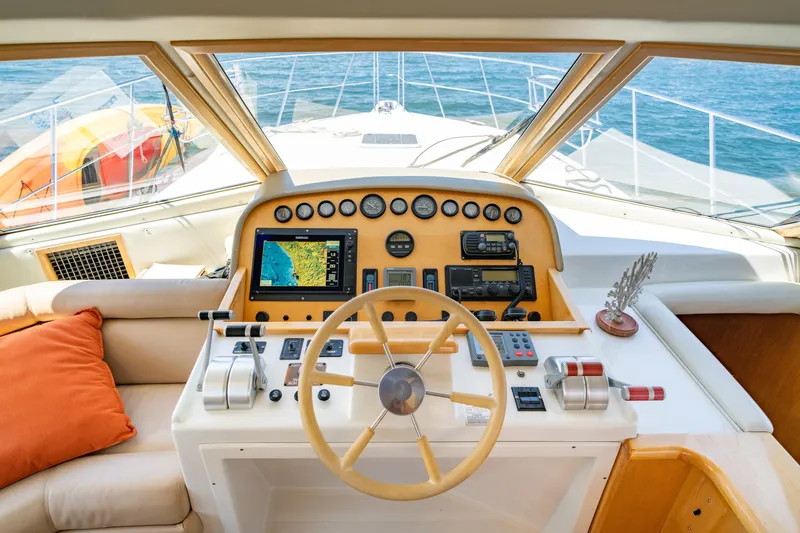 Altitude Adjustment Yacht Photos Pics Cockpit of 2000 Navigator 5300 Classic yacht with steering wheel and navigation instruments.