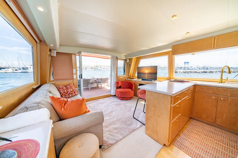 Altitude Adjustment Yacht Photos Pics Luxurious interior of 2000 Navigator 5300 Classic yacht with modern furnishings and scenic views.