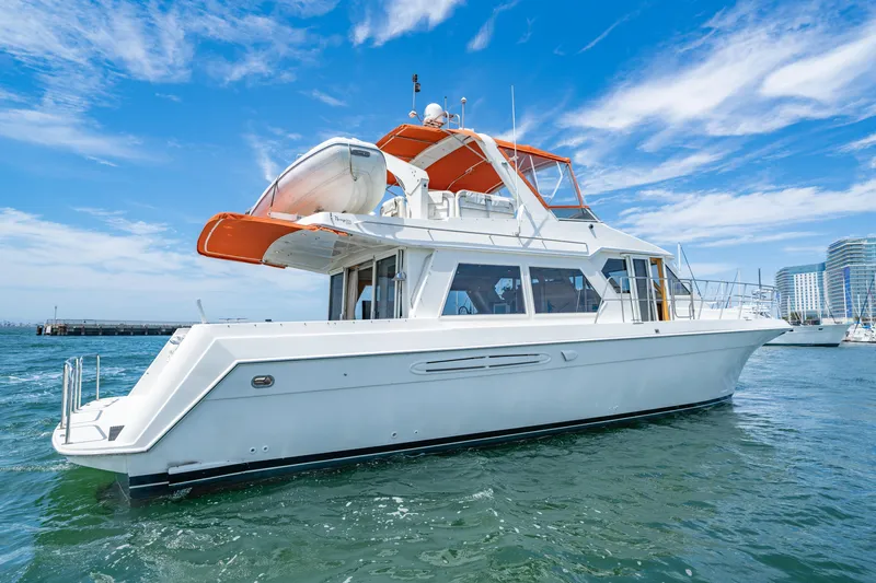 Altitude Adjustment Yacht Photos Pics Navigator 5300 Classic 2000 yacht on water, clear sky, modern design, luxury boating.