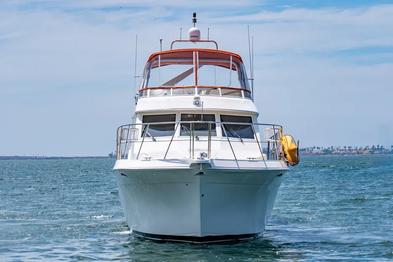 Altitude Adjustment Yacht Photos Pics Front view of a 2000 Navigator 5300 Classic yacht on open water.