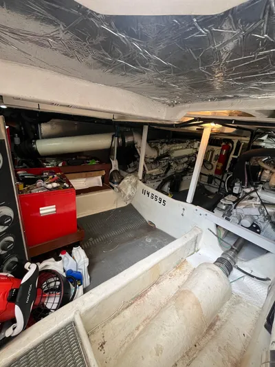 Our Time Yacht Photos Pics Engine room of 2001 Bayliner 5788 Pilot House Motoryacht with equipment and tools.