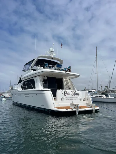 Our Time Yacht Photos Pics 2001 Bayliner 5788 Pilot House Motoryacht docked in Newport Beach marina.