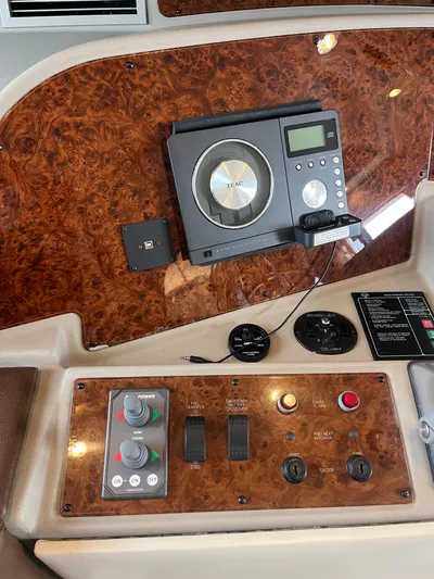 Our Time Yacht Photos Pics Control panel of a 2001 Bayliner 5788 Pilot House Motoryacht with audio system.