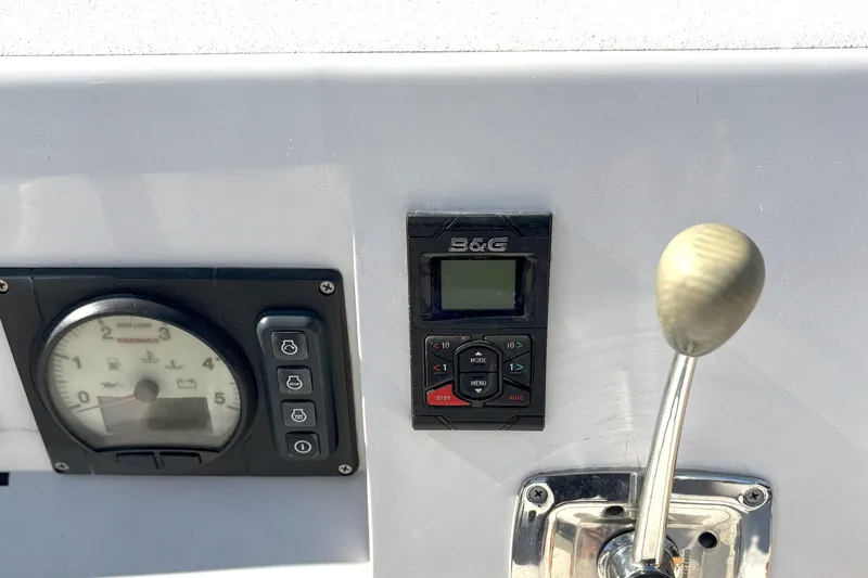 Ripple Yacht Photos Pics Control panel of a 2015 J Boats J 111, featuring gauges and a throttle lever.