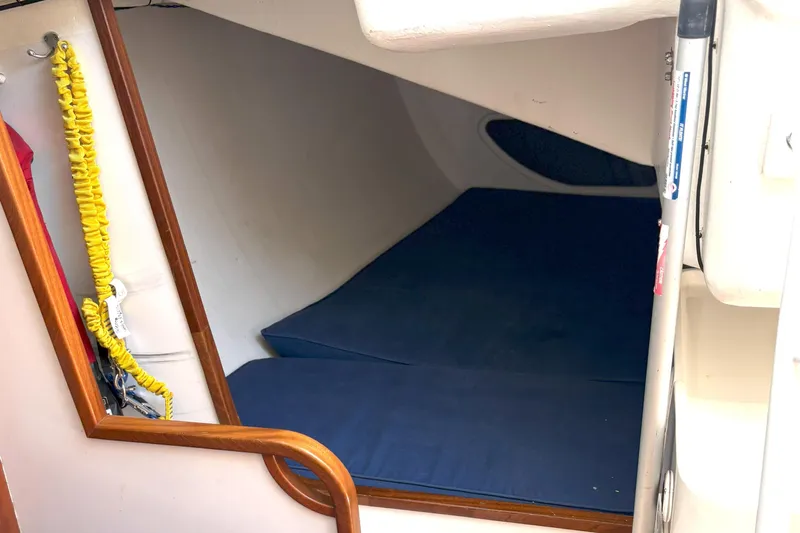 Ripple Yacht Photos Pics Interior cabin of 2015 J Boats J 111 sailboat with blue cushions.
