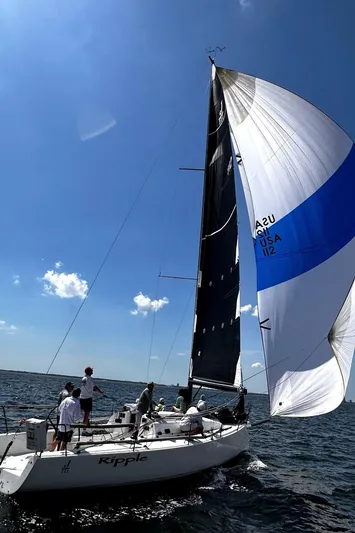 Ripple Yacht Photos Pics 2015 J Boats J 111 sailing on open water under clear blue skies.