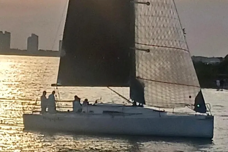 Ripple Yacht Photos Pics Sailing J Boats J 111, 2015 model, at sunset on calm waters.