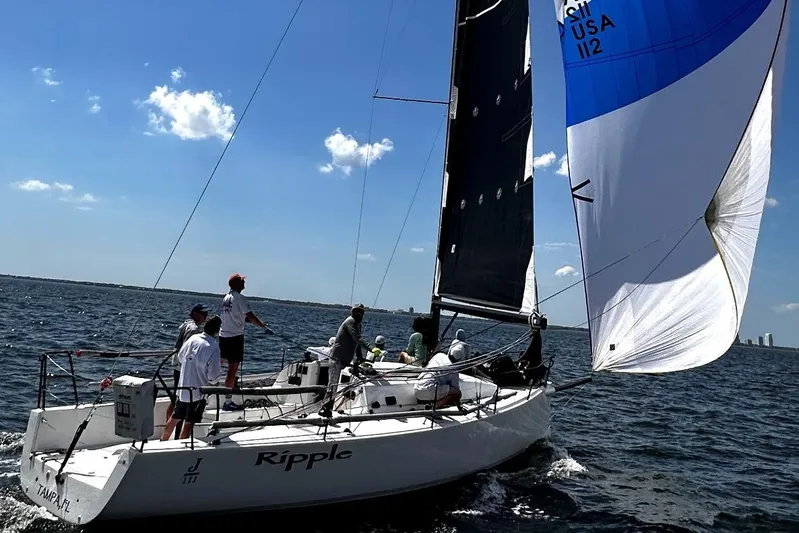 Ripple Yacht Photos Pics 2015 J Boats J 111 sailboat "Ripple" sailing on open water under clear skies.