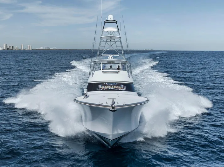 Life Is Good Yacht Photos Pics 2015 Viking 70 Convertible yacht cruising swiftly on open ocean waters.