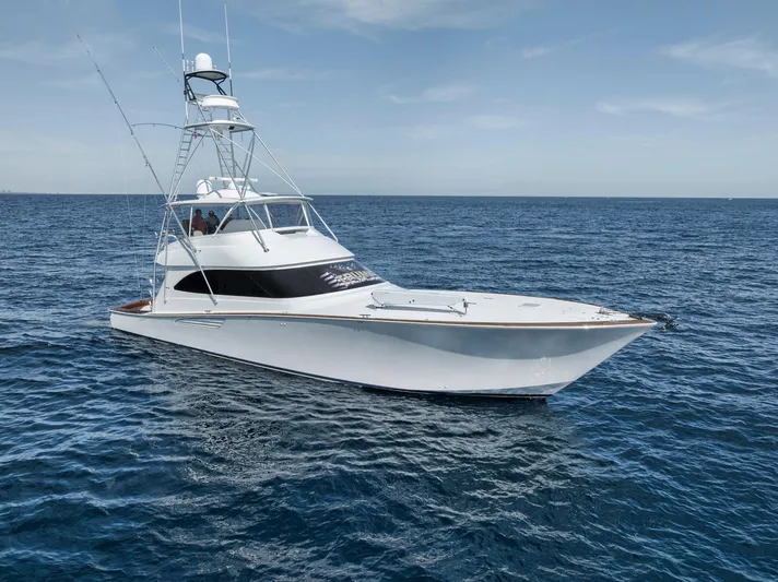 Life Is Good Yacht Photos Pics 2015 Viking 70 Convertible yacht on open sea under clear sky.