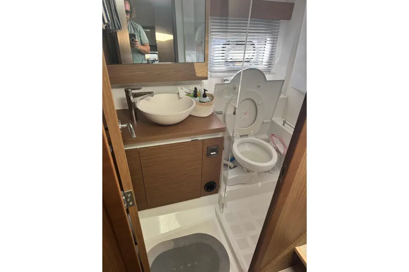 Lololand Yacht Photos Pics Modern bathroom in 2018 Jeanneau Leader 36 yacht with sink and toilet.