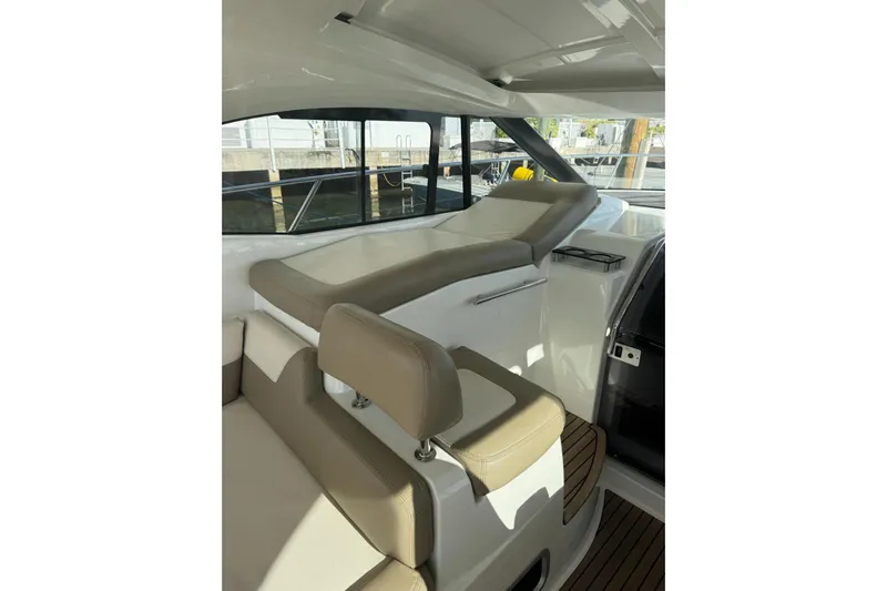 Lololand Yacht Photos Pics 2018 Jeanneau Leader 36 interior with beige seating and sleek design.